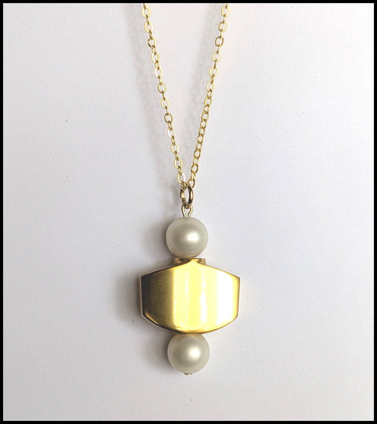 Gold tuner button necklace