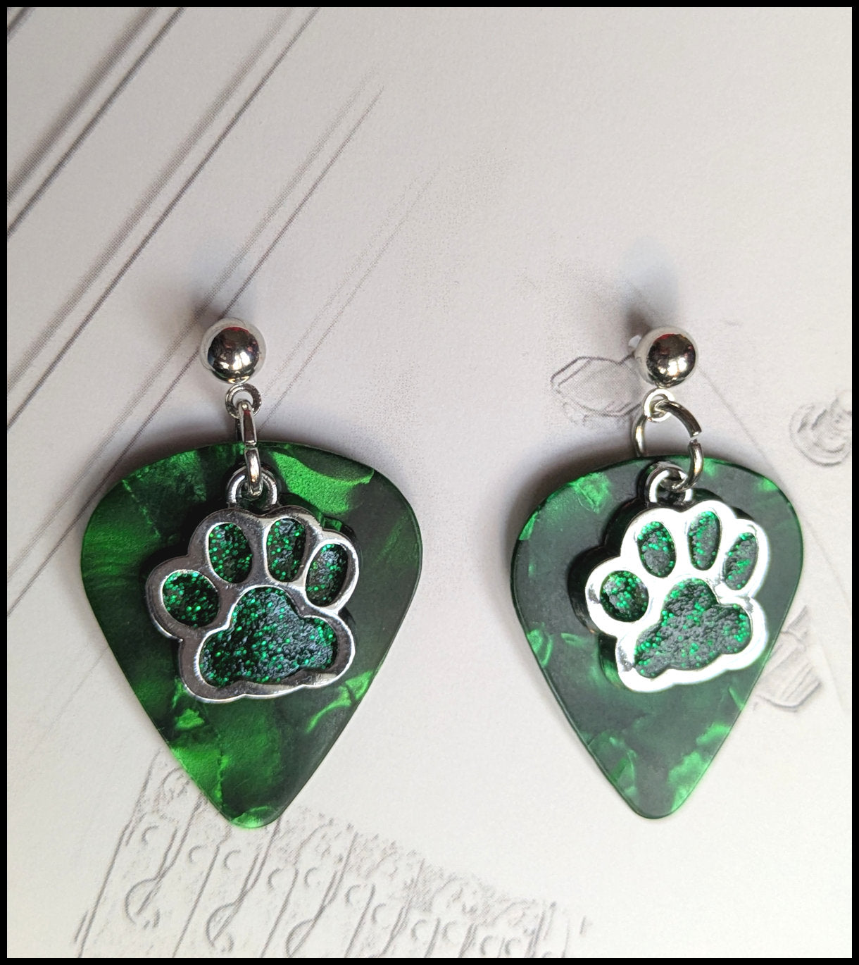 Music and paw print earrings