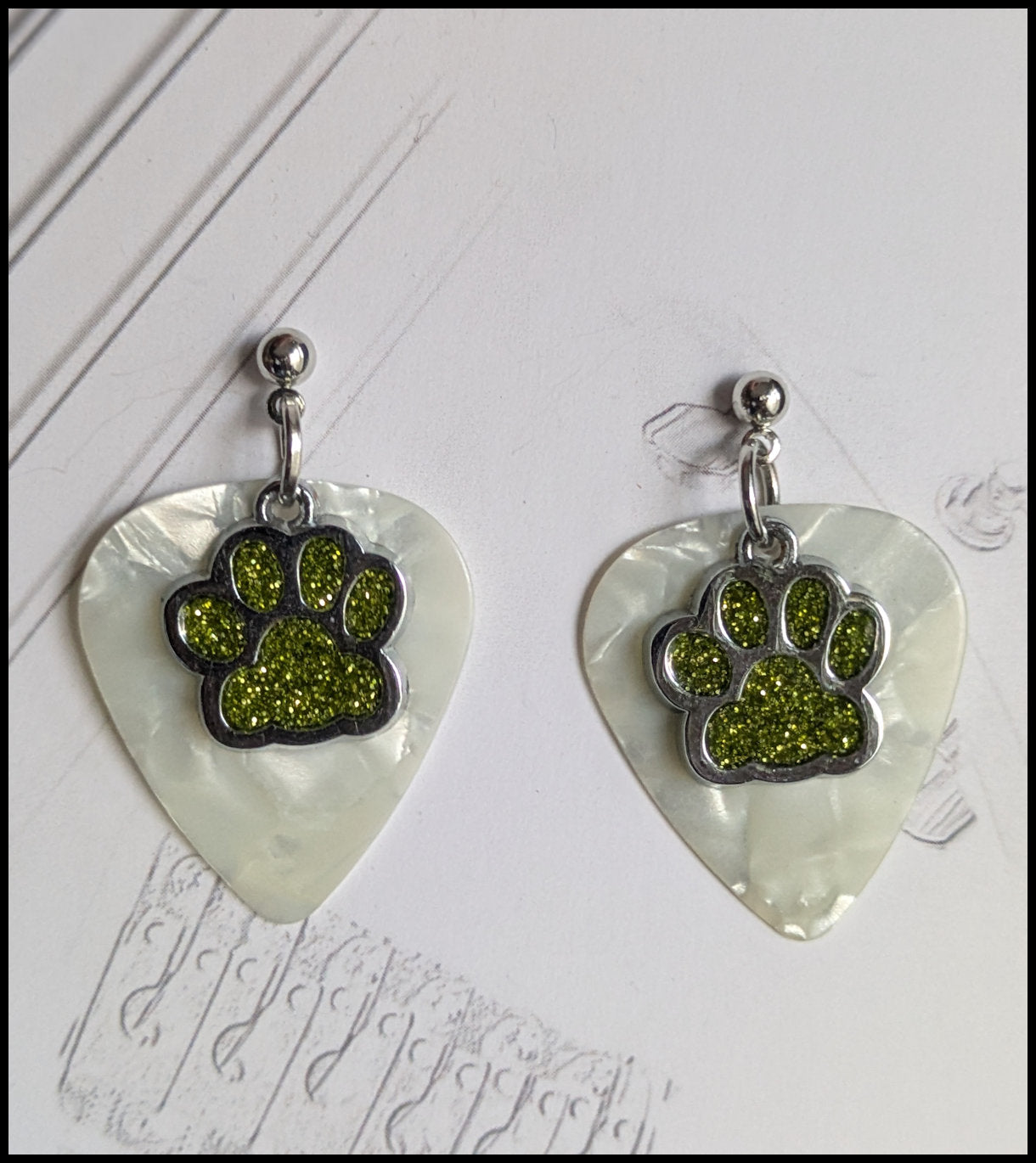 Music and paw print earrings