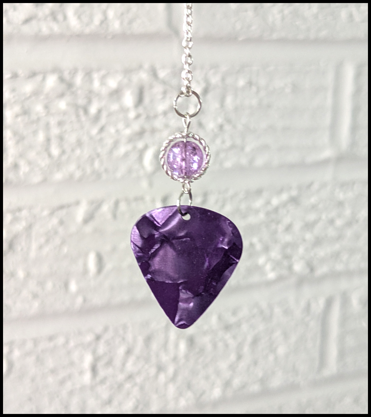 Guitar pick necklace