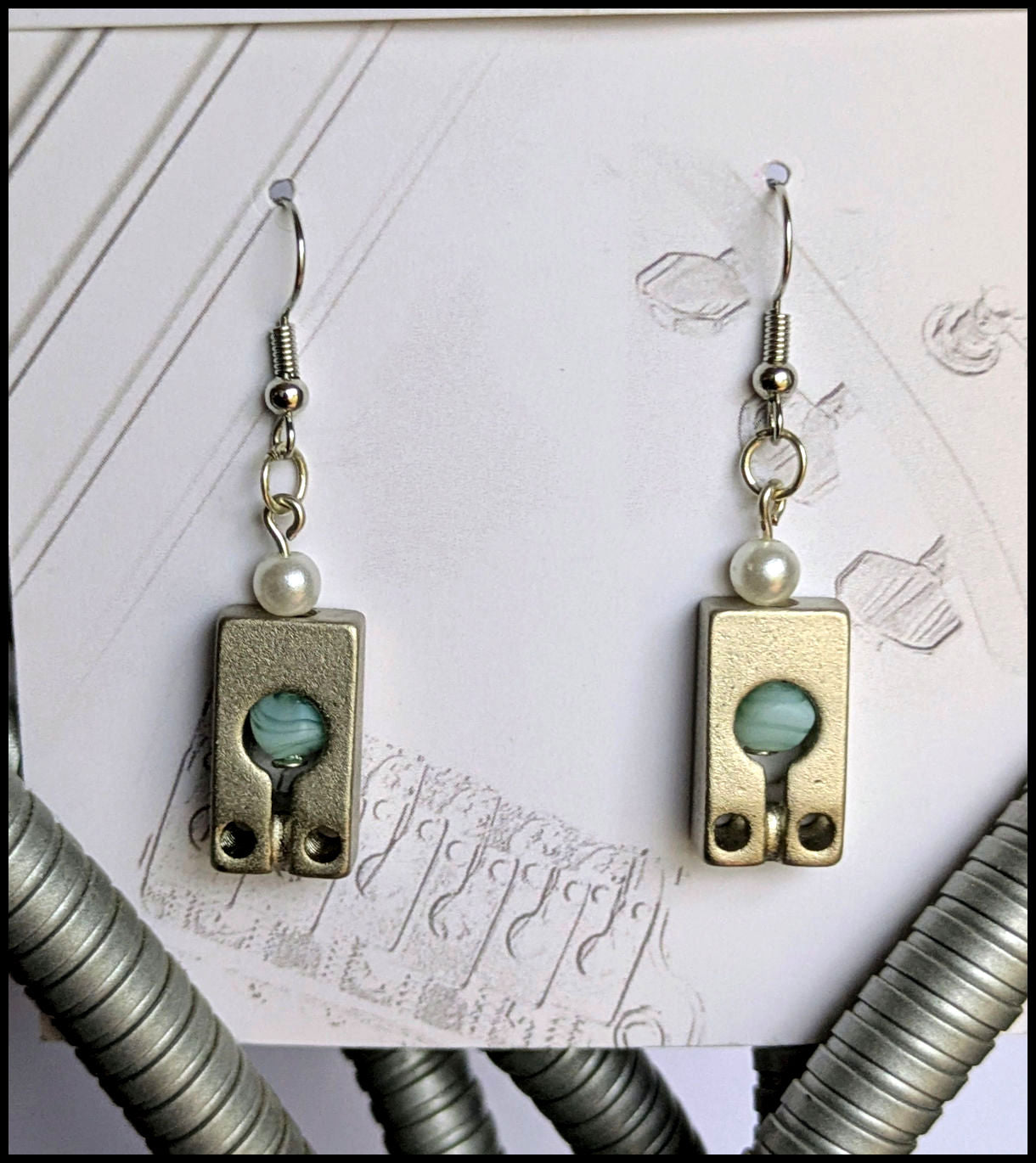 Silver saddle earrings